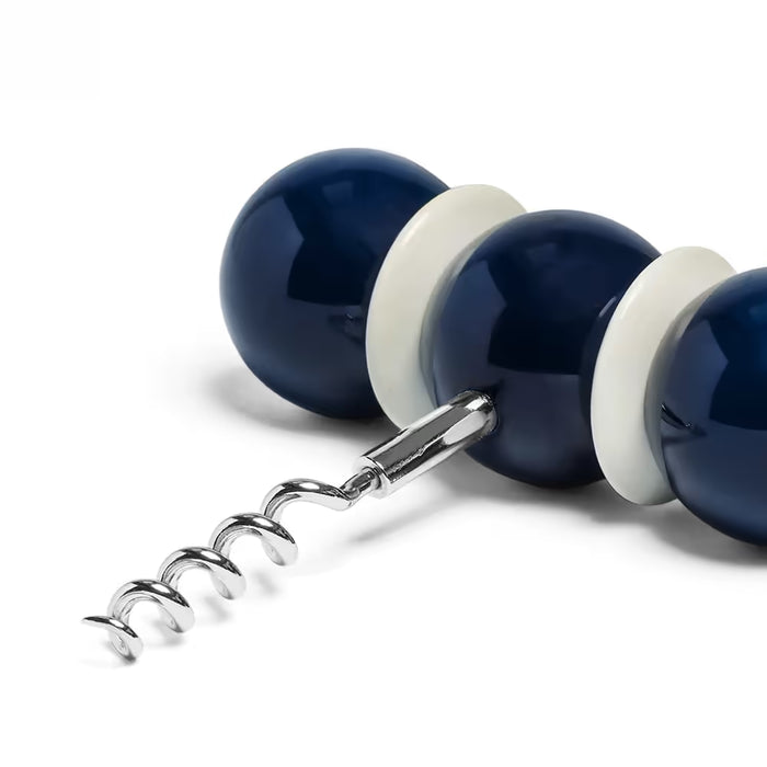 Corkscrew with blue and white handles on a white background
