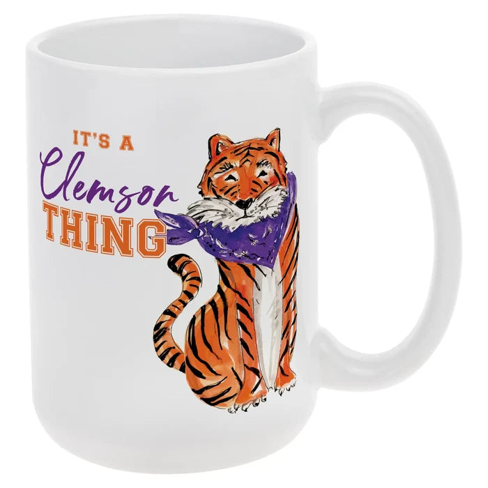 White mug with a tiger design and text 'It's a Clemson Thing' on a white background