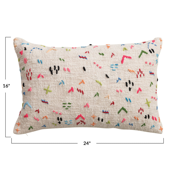 Decorative pillow with colorful abstract pattern on a beige background, with dimensions indicated.