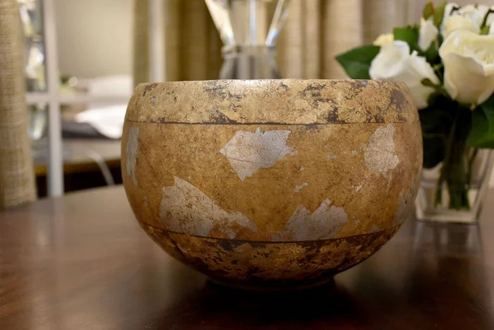 Decorative bowl on a table with a blurred background