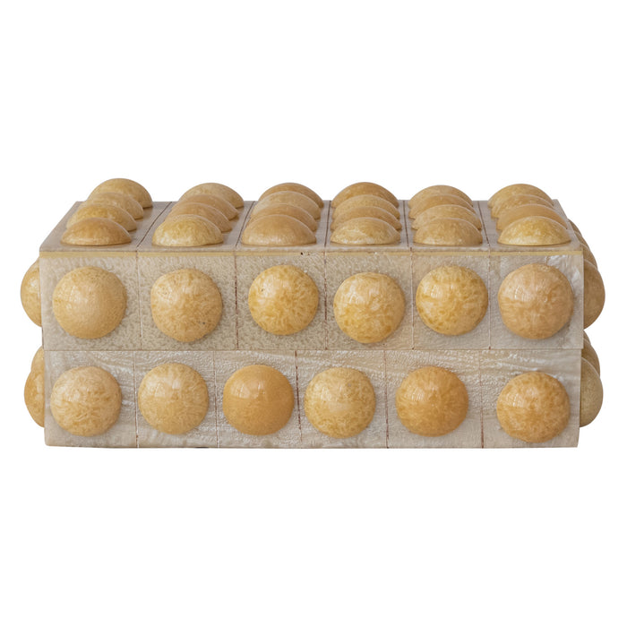 Wooden box with circular adornments on a white background From The Pharmacy Gift Shop