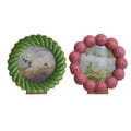 Two decorative items with green and pink bead designs featuring a dog on a white background.