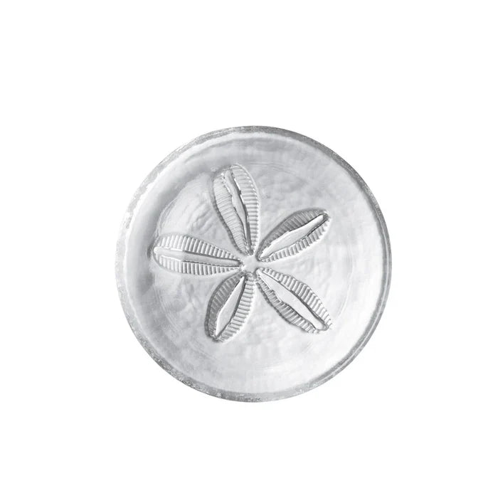 Decorative stone with sand dollar design on a white background