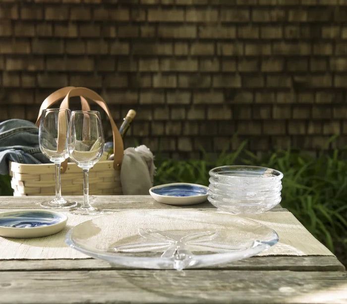 Glassware on a wooden table with a rustic background