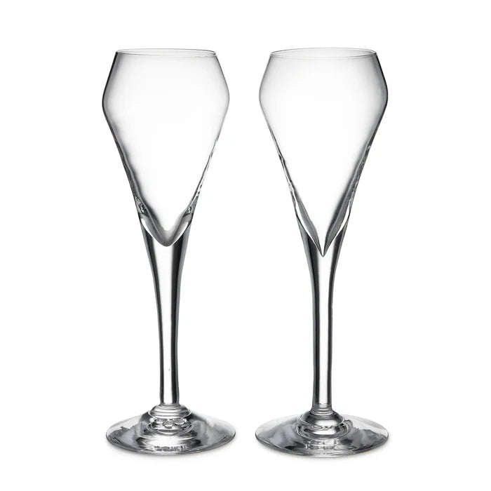 Two clear wine glasses on a white background